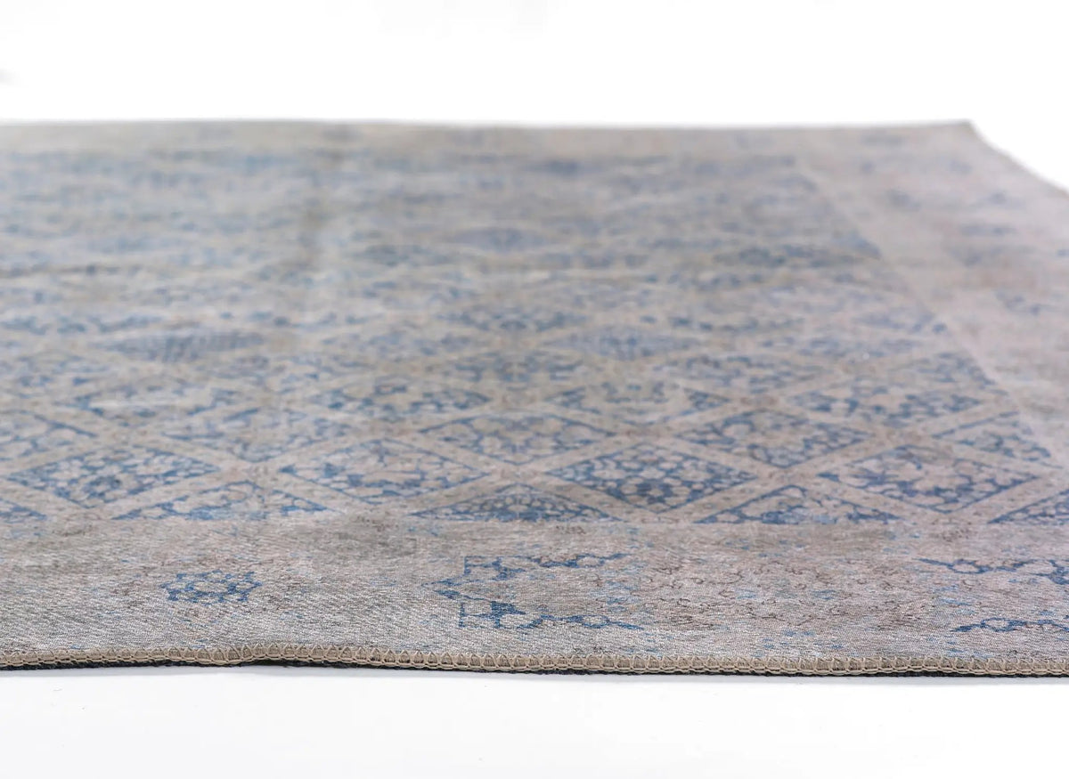 Erin Gates by Momeni Dorset DOR-3 blue area rug featuring a vintage-inspired diamond pattern and durable machine-made construction.