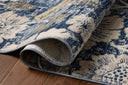 Featuring casual denim and warm natural hues and botanical detail, the Eileen ELE-03 Denim / Natural Area Rug is a power-loomed polypropylene and polyester area rug for any room