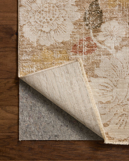 A power-loomed polypropylene and polyester area rug with botanical flair in warm natural and vibrant multi-toned tones, the Eileen ELE-03 Natural / Multi Area Rug anchors any room