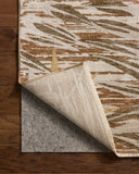 With earthy and warm natural hues and botanical styling, the Eileen ELE-05 Earth / Natural Area Rug is a power-loomed polypropylene and polyester area rug that elevates any room