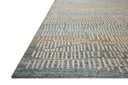 The Elias ELA-02 Ocean / Oatmeal Area Rug combines serene ocean and cozy oatmeal tones and graphic and high-low textured patterns in a hand-tufted wool area rug for effortless elegance