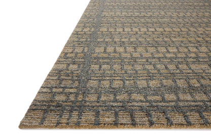 The Elias ELA-05 Wheat / Charcoal Area Rug offers golden wheat and deep charcoal sophistication and graphic and high-low textured charm in a hand-tufted wool area rug