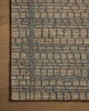 The Elias ELA-05 Wheat / Charcoal Area Rug offers golden wheat and deep charcoal sophistication and graphic and high-low textured charm in a hand-tufted wool area rug