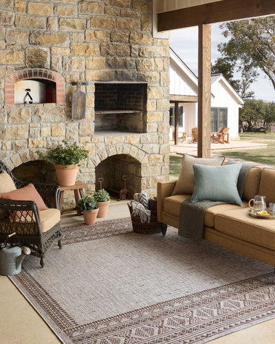 With coffee and gentle dove hues, the Easton ESN-01 Coffee / Dove Area Rug is a power-loomed polypropylene area rug that elevates any room