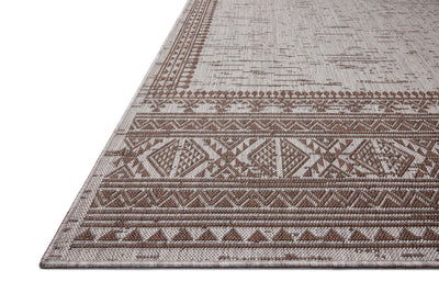 With coffee and gentle dove hues, the Easton ESN-01 Coffee / Dove Area Rug is a power-loomed polypropylene area rug that elevates any room