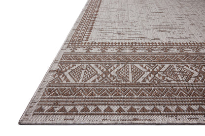 With coffee and gentle dove hues, the Easton ESN-01 Coffee / Dove Area Rug is a power-loomed polypropylene area rug that elevates any room