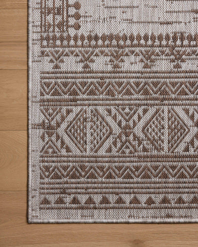 With coffee and gentle dove hues, the Easton ESN-01 Coffee / Dove Area Rug is a power-loomed polypropylene area rug that elevates any room