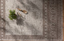 With coffee and gentle dove hues, the Easton ESN-01 Coffee / Dove Area Rug is a power-loomed polypropylene area rug that elevates any room