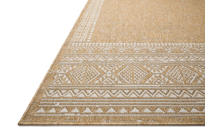 The Easton ESN-01 Ivory / Wheat Area Rug blends refined ivory and golden wheat tones into a power-loomed polypropylene area rug with timeless appeal