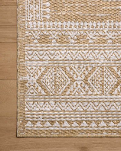 The Easton ESN-01 Ivory / Wheat Area Rug blends refined ivory and golden wheat tones into a power-loomed polypropylene area rug with timeless appeal