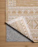 The Easton ESN-01 Ivory / Wheat Area Rug blends refined ivory and golden wheat tones into a power-loomed polypropylene area rug with timeless appeal