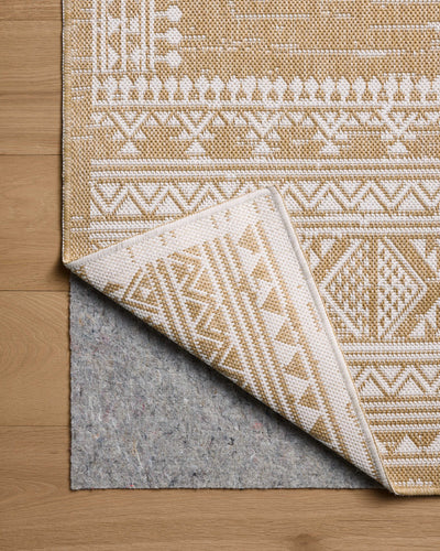 The Easton ESN-01 Ivory / Wheat Area Rug blends refined ivory and golden wheat tones into a power-loomed polypropylene area rug with timeless appeal