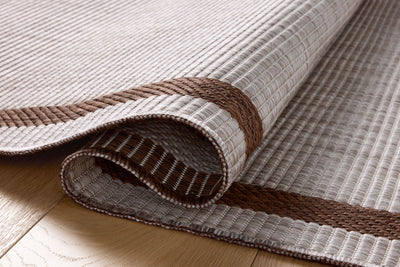 A stunning power-loomed polypropylene area rug, the Easton ESN-02 Dove / Coffee Area Rug features gentle dove and coffee tones for a polished look