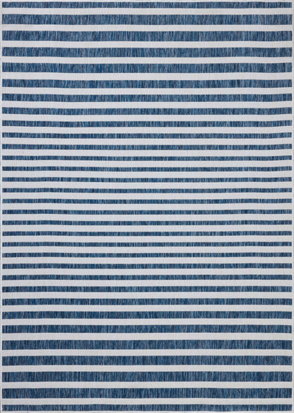 The Easton ESN-03 Denim / Ivory Area Rug delivers casual denim and refined ivory beauty in a power-loomed polypropylene area rug