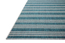 Designed in vibrant teal and misty hues, the Easton ESN-04 Teal / Fog Area Rug is a power-loomed polypropylene area rug that stands out