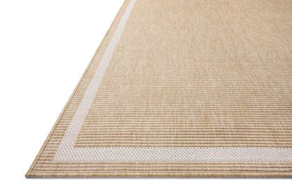 The Easton ESN-05 Wheat / Ivory Area Rug combines golden wheat and refined ivory tones with a power-loomed polypropylene area rug for effortless elegance