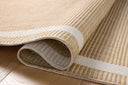 The Easton ESN-05 Wheat / Ivory Area Rug combines golden wheat and refined ivory tones with a power-loomed polypropylene area rug for effortless elegance