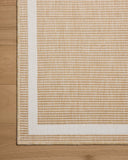The Easton ESN-05 Wheat / Ivory Area Rug combines golden wheat and refined ivory tones with a power-loomed polypropylene area rug for effortless elegance