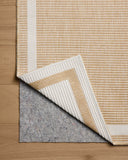 The Easton ESN-05 Wheat / Ivory Area Rug combines golden wheat and refined ivory tones with a power-loomed polypropylene area rug for effortless elegance