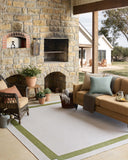 Rich in green and refined ivory hues, the Easton ESN-07 Green / Ivory Area Rug is a power-loomed polypropylene area rug built for style and comfort