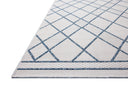 The Easton ESN-08 Ivory / Denim Area Rug offers refined ivory and casual denim sophistication in a power-loomed polypropylene area rug