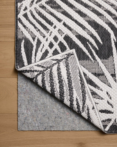 Expertly crafted as a power-loomed polypropylene area rug, the Easton ESN-09 Ivory / Onyx Area Rug captures refined ivory and bold onyx tones beautifully