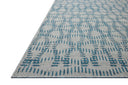 The Easton ESN-10 Fog / Teal Area Rug brings misty and vibrant teal character to your home in a power-loomed polypropylene area rug