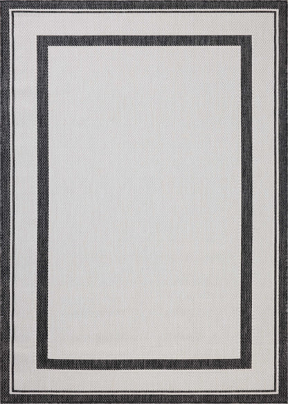 Finished in bold onyx and refined ivory tones, the Easton ESN-11 Onyx / Ivory Area Rug is a power-loomed polypropylene area rug for modern living