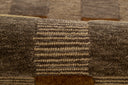 Momeni Fletcher FLT‑1 brown area rug with Bauhaus‑inspired checkerboard pattern, handcrafted 100% wool.