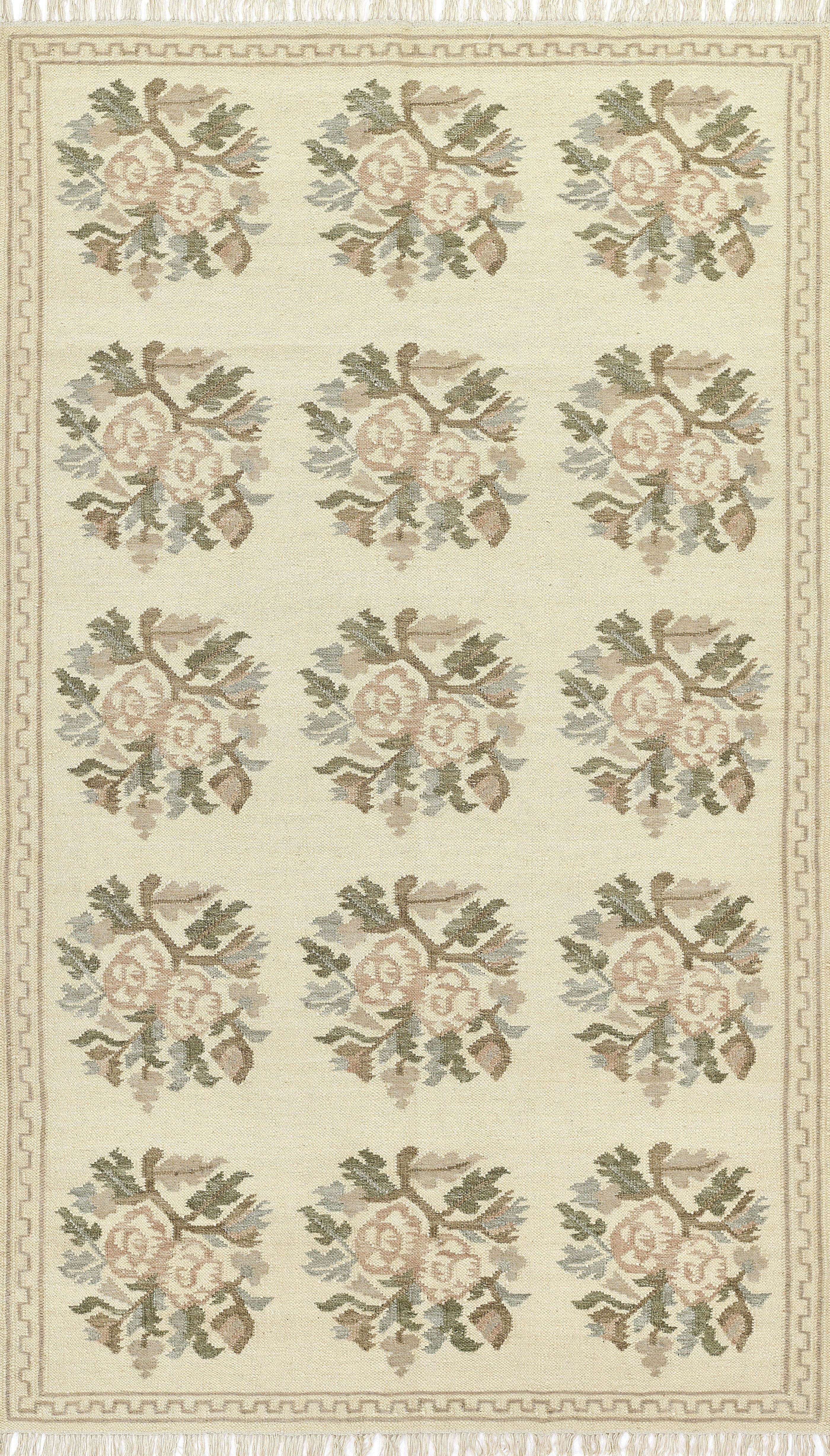 Momeni Florence FLO-1 ivory floral wool area rug with Bessarabian-style rose bouquet design, subtle blue and blush accents, ornamental border, and fringe.