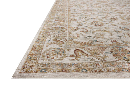 Designed with traditional and abstract artistry in warm natural and glowing sunset hues, the Gaia GAA-04 Natural / Sunset Area Rug is a power-loomed 100% polyester area rug that stands out
