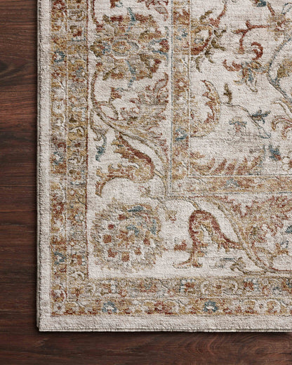 Designed with traditional and abstract artistry in warm natural and glowing sunset hues, the Gaia GAA-04 Natural / Sunset Area Rug is a power-loomed 100% polyester area rug that stands out