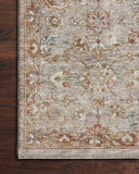 A power-loomed 100% polyester area rug featuring traditional and abstract design and warm natural and vibrant multi-toned tones, the Gaia GAA-05 Natural / Multi Area Rug adds character to any room