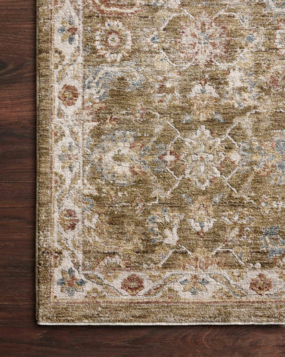 The Gaia GAA-05 Olive / Multi Area Rug highlights earthy olive and vibrant multi-toned tones and traditional and abstract texture in a beautifully made power-loomed 100% polyester area rug