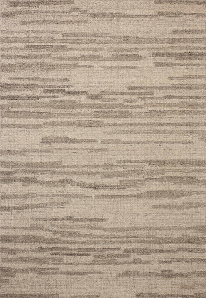 With shimmering silver and elegant grey hues and traditional styling, the Hartley HRT-02 Silver / Grey Area Rug is a hand-tufted wool area rug that elevates any room