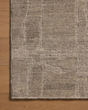 The Hartley HRT-03 Grey / Pebble Area Rug blends elegant grey and subtle pebble tones and traditional motifs into a hand-tufted wool area rug with timeless appeal