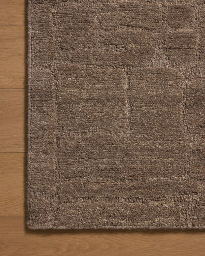 A stunning hand-tufted wool area rug with traditional detail, the Hartley HRT-04 Brown / Mocha Area Rug features brown and luxurious mocha tones for a polished look