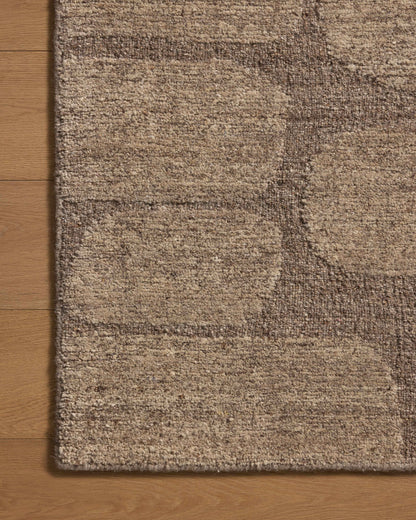 The Hartley HRT-05 Brown / Taupe Area Rug delivers brown and versatile taupe beauty and traditional elegance in a hand-tufted wool area rug