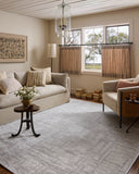 A power-loomed polyester area rug with geometric design in elegant grey and refined ivory hues, the Hollis HOL-01 Grey / Ivory Area Rug is a standout in any décor