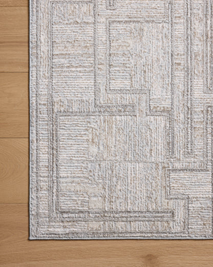 A power-loomed polyester area rug with geometric design in elegant grey and refined ivory hues, the Hollis HOL-01 Grey / Ivory Area Rug is a standout in any décor