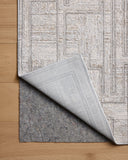 A power-loomed polyester area rug with geometric design in elegant grey and refined ivory hues, the Hollis HOL-01 Grey / Ivory Area Rug is a standout in any décor