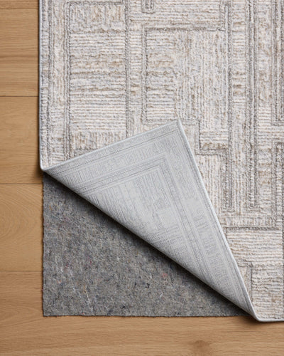 A power-loomed polyester area rug with geometric design in elegant grey and refined ivory hues, the Hollis HOL-01 Grey / Ivory Area Rug is a standout in any décor