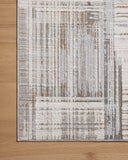 The Hollis HOL-02 Pebble / Ivory Area Rug highlights subtle pebble and refined ivory tones and geometric texture in a beautifully made power-loomed polyester area rug