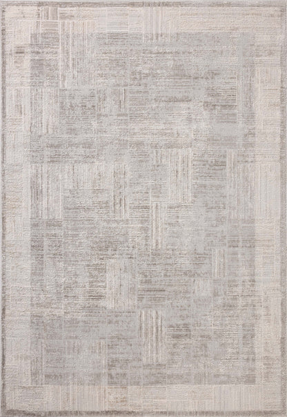 The Hollis HOL-04 Smoke / Mist Area Rug transforms any space with smoky and soft misty tones and geometric design in a power-loomed polyester area rug