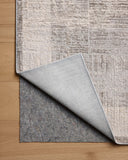 The Hollis HOL-04 Smoke / Mist Area Rug transforms any space with smoky and soft misty tones and geometric design in a power-loomed polyester area rug