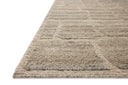 Dressed in gentle dove hues with graphic detail, the Hughes HUS-01 Dove Area Rug is a hand-knotted wool area rug that completes any room