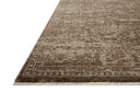 Designed with traditional and distressed artistry in striking granite and warm natural hues, the Haywood HYD-01 Granite / Natural Area Rug is a power-loomed polyester area rug that stands out