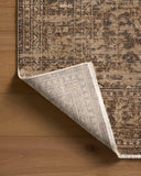 Designed with traditional and distressed artistry in striking granite and warm natural hues, the Haywood HYD-01 Granite / Natural Area Rug is a power-loomed polyester area rug that stands out