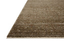 The Haywood HYD-01 Sage / Brown Area Rug combines calming sage and brown tones and traditional and distressed patterns in a power-loomed polyester area rug for effortless elegance