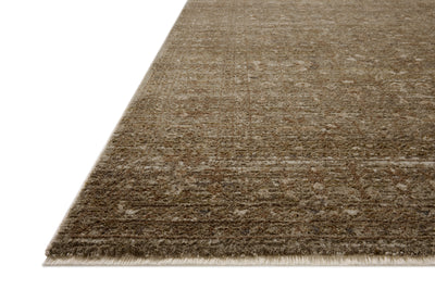 The Haywood HYD-01 Sage / Brown Area Rug combines calming sage and brown tones and traditional and distressed patterns in a power-loomed polyester area rug for effortless elegance